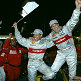 Tom Kristensen and Rinaldo Capello celebrate the ALMS title