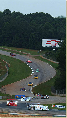 Eventual winner #38 Champion Audi leads a pack of cars through the "S" turns