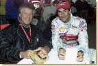 Racing legend Mario Andretti (left) with Audi driver Emanuele Pirro (right) at the 2001 Le Mans 24 Hour race
