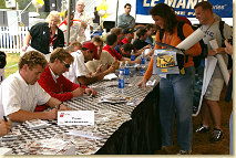 The Audi drivers during an autograph session at Road Atlanta