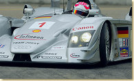 Marco Werner steers the #1 Infineon Team Joest Audi R8 on the way to winning