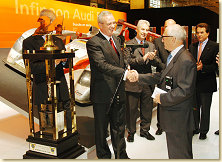 ACO president Michel Cosson presents the Le Mans trophy to Dr Martin Winterkorn, Chairman of the Board at AUDI AG