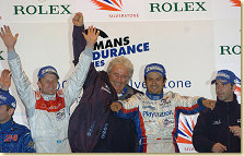 Allan McNish, Hugues de Chaunac and Stéphane Ortelli on the podium