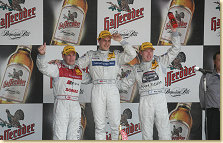 Tom Kristensen, Gary Paffett and Mika Häkkinen on the podium