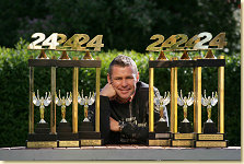Tom Kristensen with his Le Mans trophies
