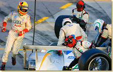 Frank Biela and Emanuele Pirro during a driver-change