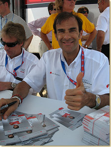 Emanuele Pirro and Frank Biela signing autographs (is better then signing cheques) in Sebring